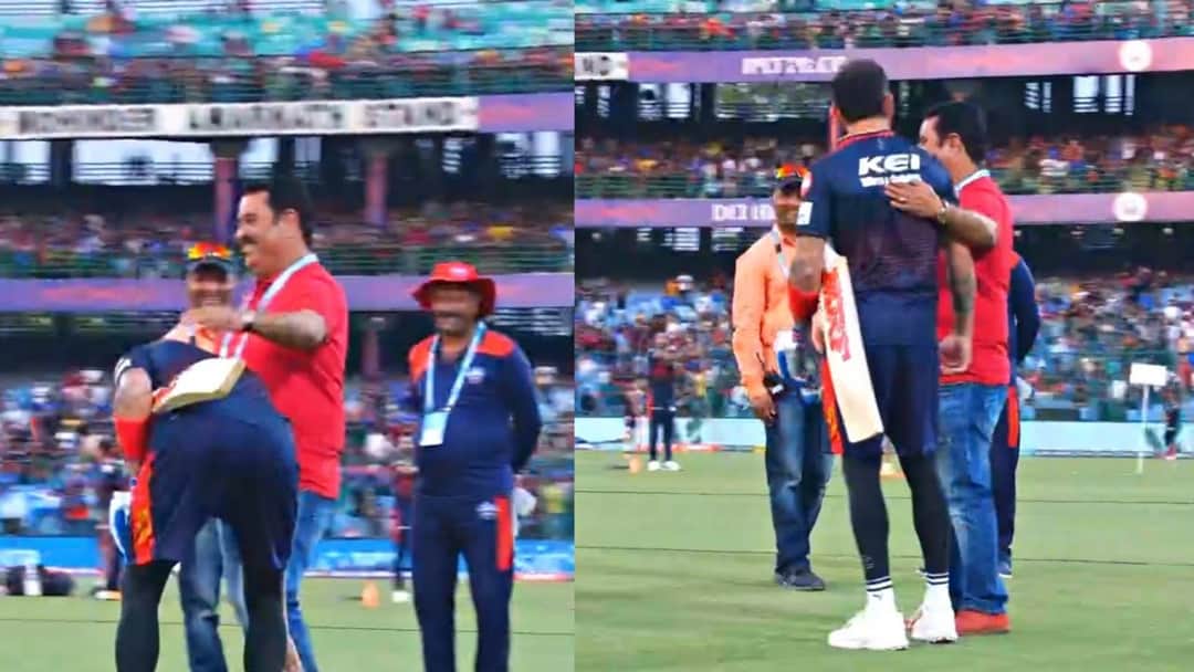 Virat Kohli touching his childhood coach's feet